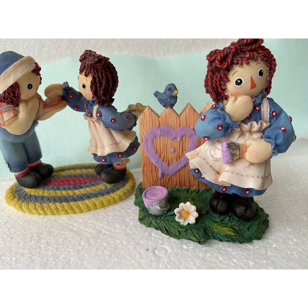 Enesco Raggedy Ann & Andy collection, specifically the "Smiles & Happiness